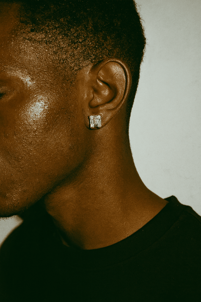 Baguette cluster stud earring worn in an ear