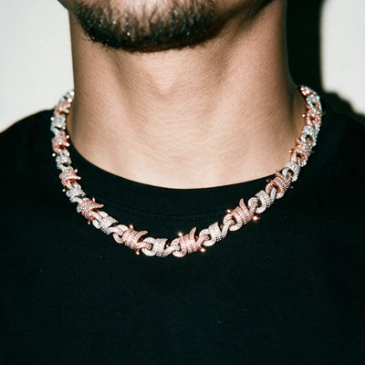 Silver 13MM Entwined Wire cuban chain worn over a black tee