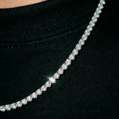 Stones of a silver 4MM tennis chain filling the frame