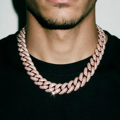 Rose gold 18MM double row micro pave cuban chain worn over a black tee