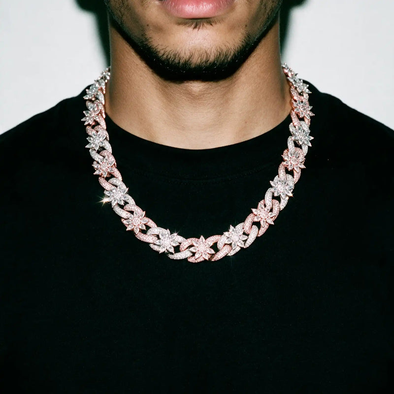 Rose gold 15MM Flora Fatale cuban chain worn over a black tee