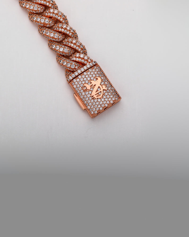 The clasp of the rose gold 18MM Double Row Micro Pave Cuban chain, showing the monogram