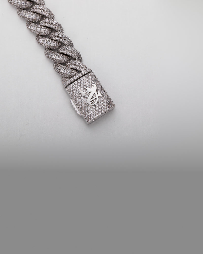 The clasp of a Nocta Vince chain, showing the monogram