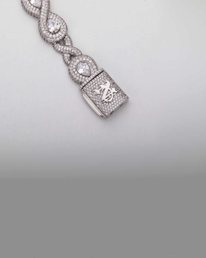 The clasp of the 15MM Navette Cuban chain, showing the monogram